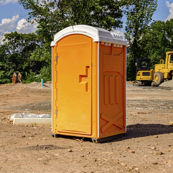 how often are the portable restrooms cleaned and serviced during a rental period in Shirley